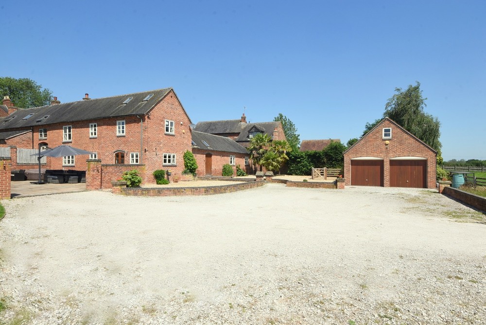 Hanbury Park Barn showcases a wealth of character and family accommodation as well as two paddocks ideal for equestrian use