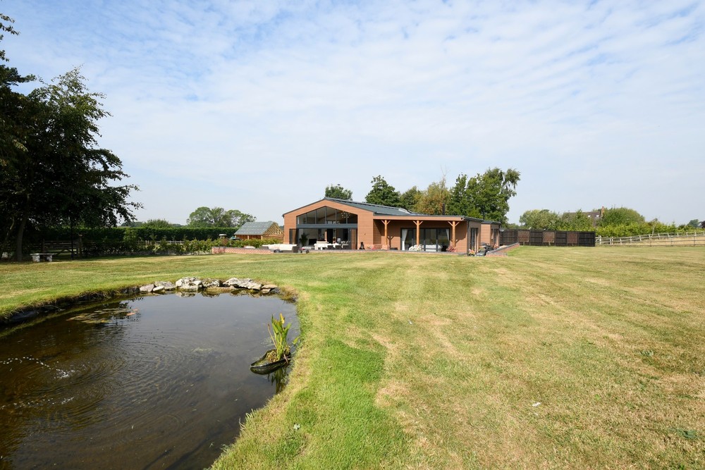NEW! Contemporary styling, a 2+ acre plot and breath-taking countryside views