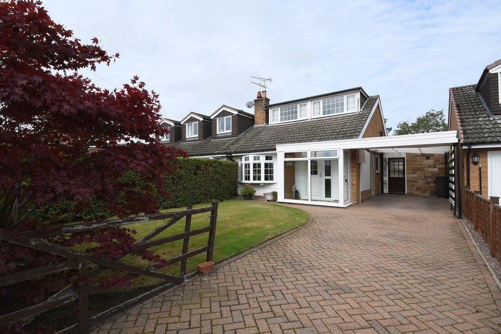 New to the Market! A semi detached dormer bungalow with a generous garden and superb potential