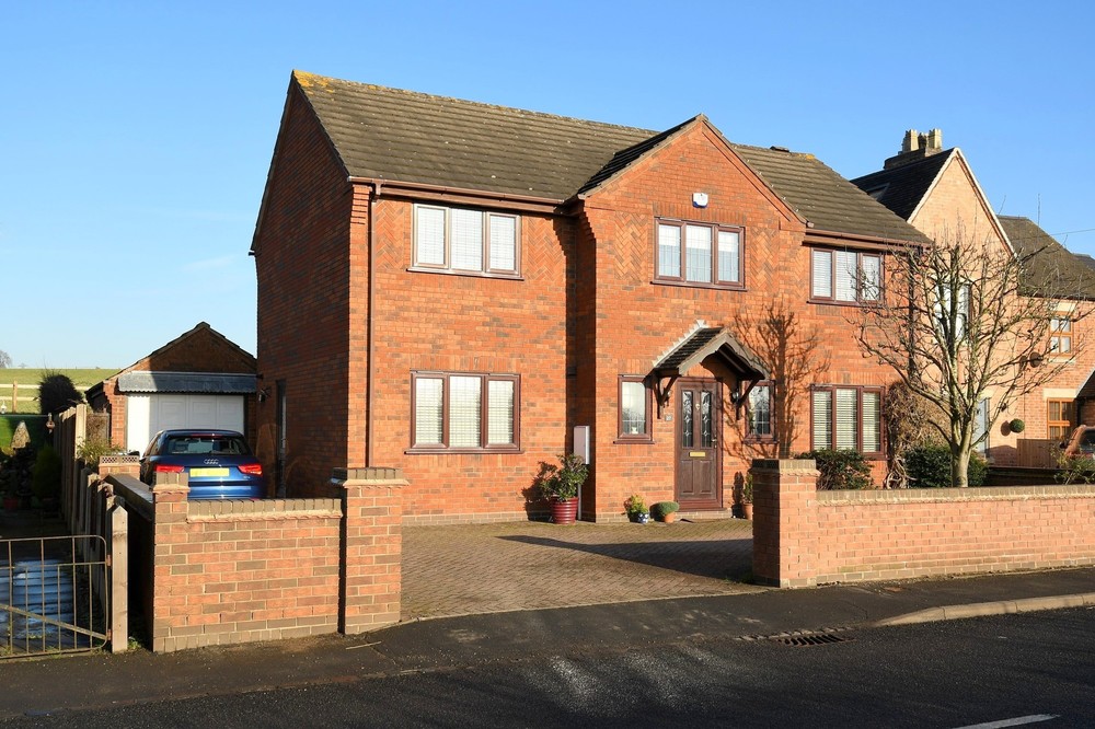 Overlooking idyllic dual aspect countryside views is this executive detached family home, offering generously proportioned and immaculate interiors, four double bedrooms and superb potential to extend/remodel as desired.