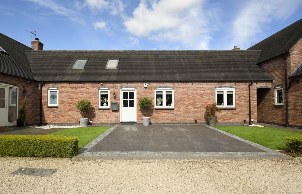 Indulge in luxury living at The Tanyard in Hammerwich with this exquisite contemporary barn conversion style home, now available for £725,000!